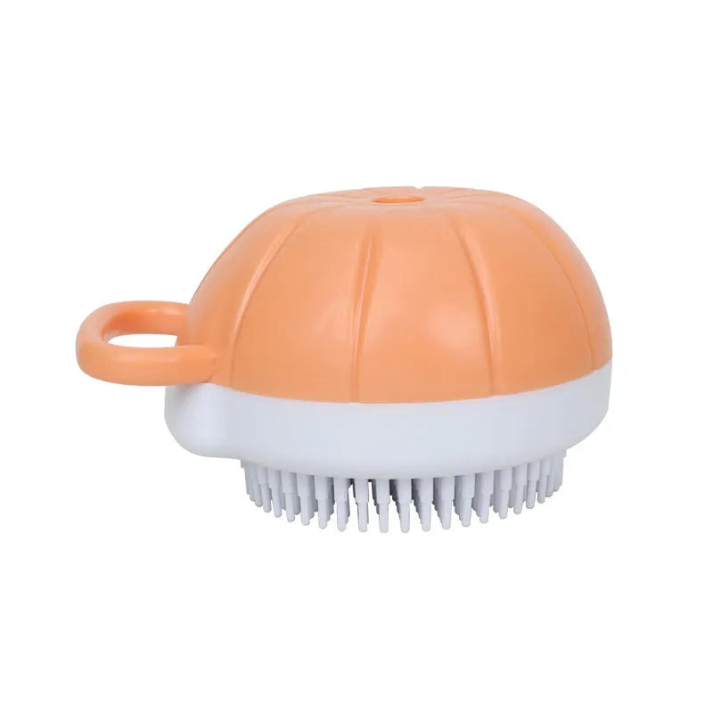 Orange silicone dog bath brush with shampoo dispenser and massage bristles for pet grooming