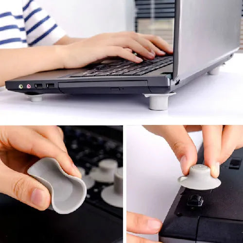Grey durable plastic laptop cooling pads, two large and two small, on a desk.