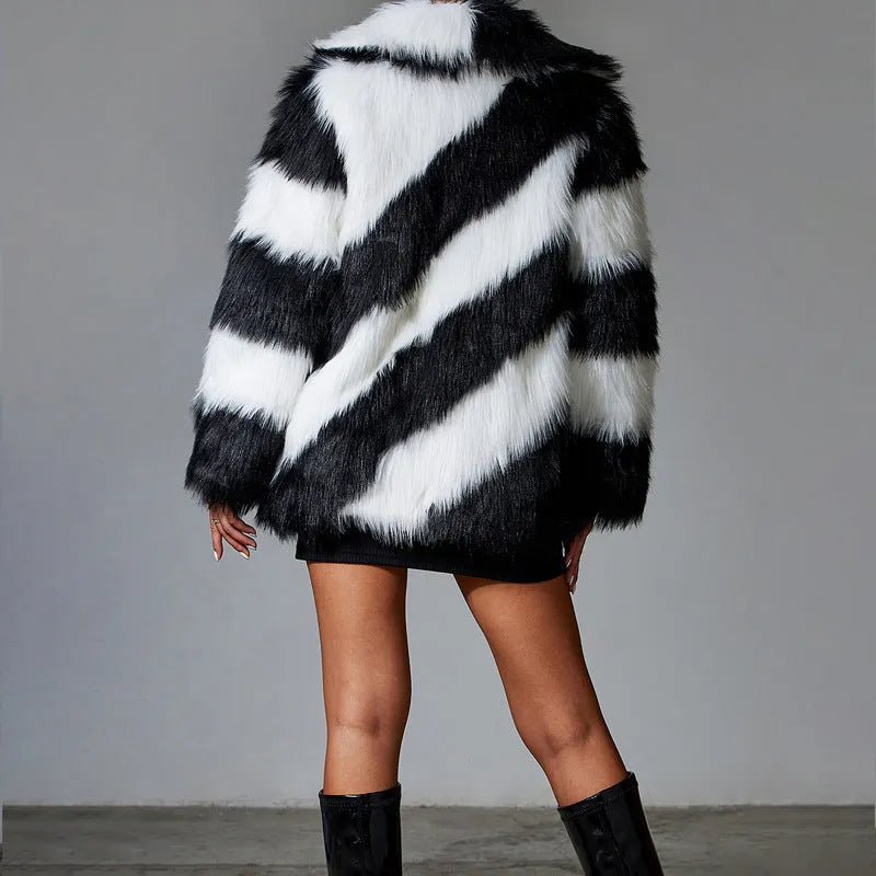 Faux fur coat with contrast lapel and detachable fur collar in shown colour.