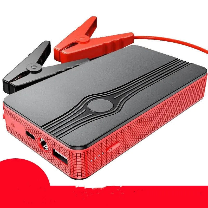 Red K4-E automobile emergency jump starter power supply with data cable.
