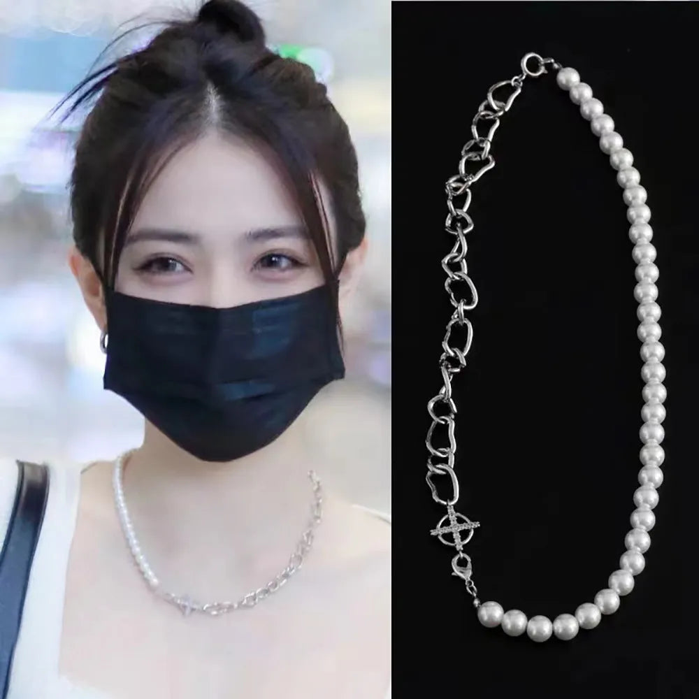 White geometric acrylic asymmetrical pendant on twisted chain clavicle necklace