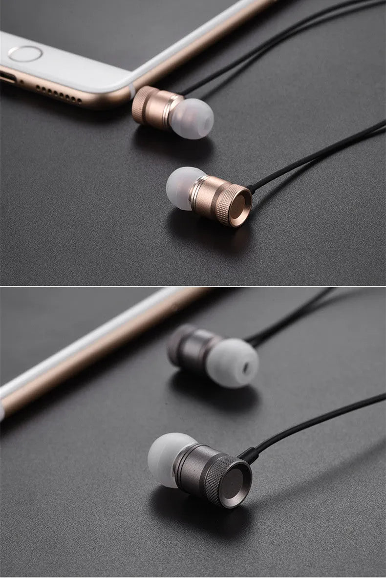 Close-up of in-ear music headphones with TPE cable in black, gold, pink and silver colour options.