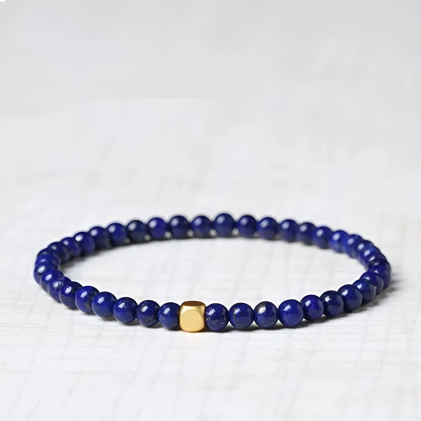 Women's green and gold natural crystal geometric bracelet with 16mm stone.