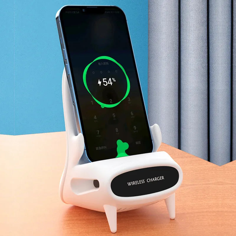 White mini chair-shaped wireless phone charger and holder on a desk