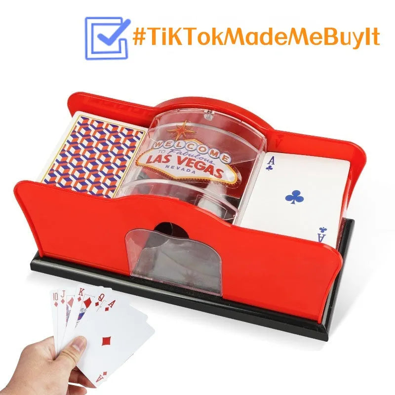 Manual card shuffler with hand crank mechanism on table with playing cards