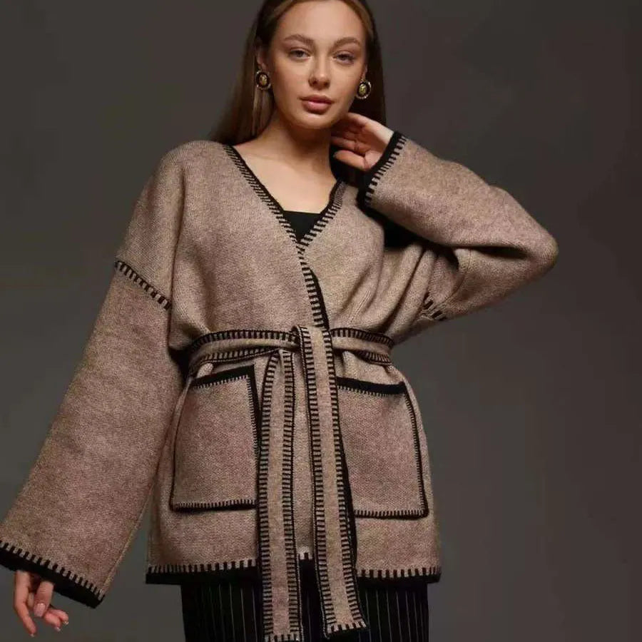 Loose lace-up knitted cardigan sweater coat in camel colour showing front detail