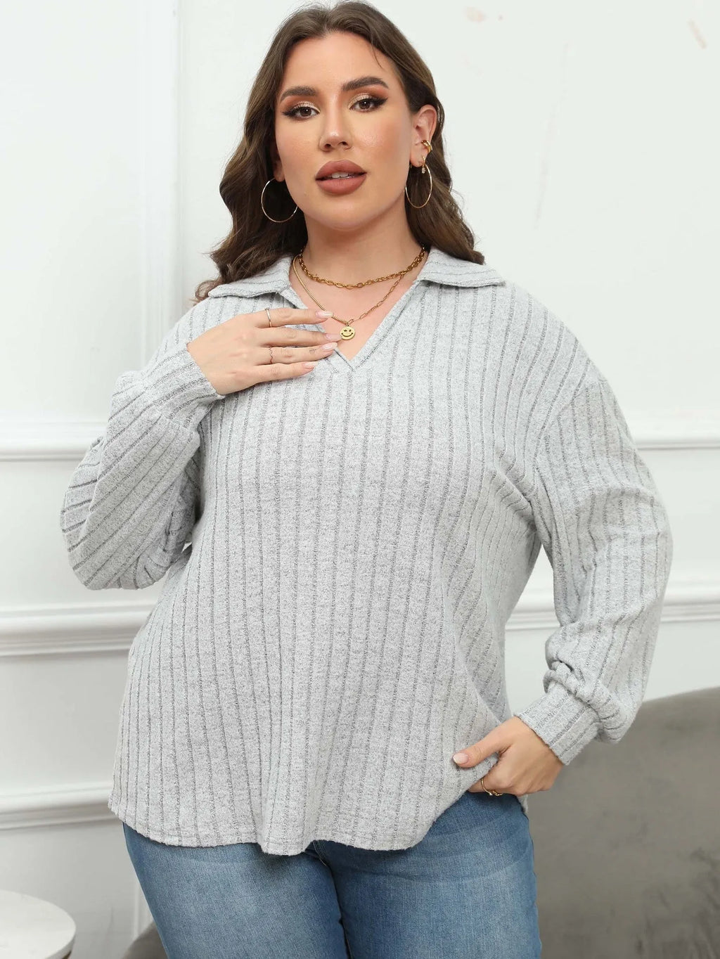 Women's plus size gray Gothic pullover shirt with a polo collar and lantern sleeves.