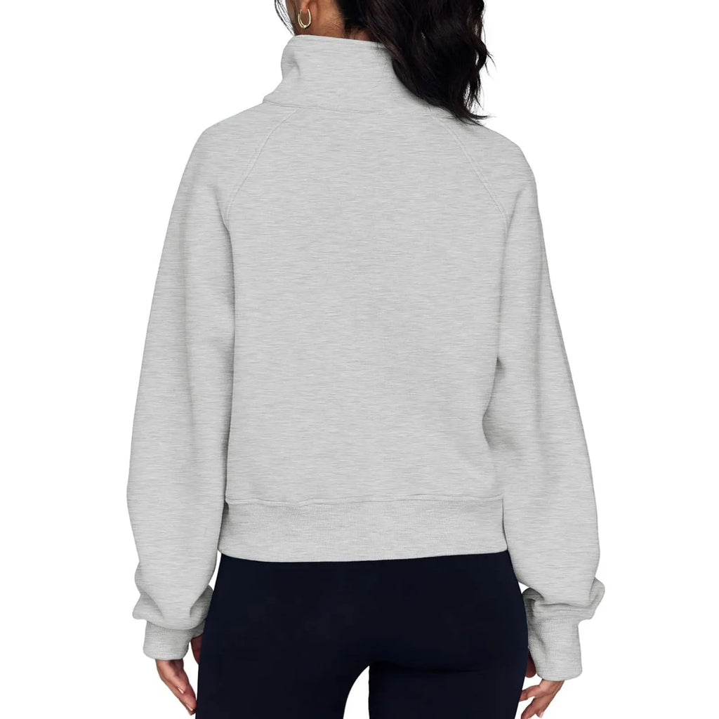 Loose lapel fleece-lined women's sweater in a solid colour with raglan long sleeves.