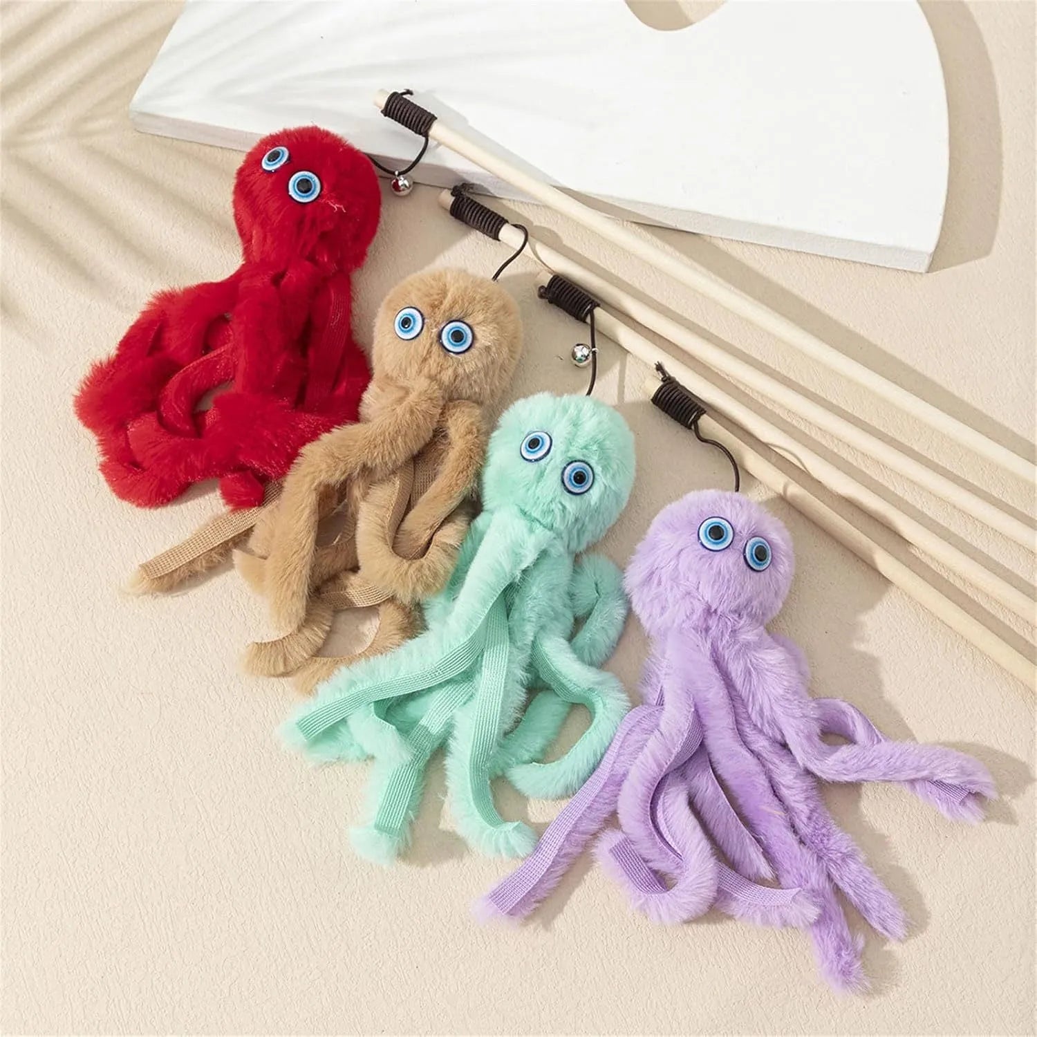 Octopus-themed cat toy with long stick in bright colours for indoor kitten play