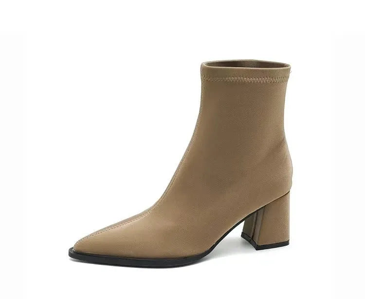 Women's khaki pointed toe Martin boots with a wedge heel and stretch artificial velboa upper.