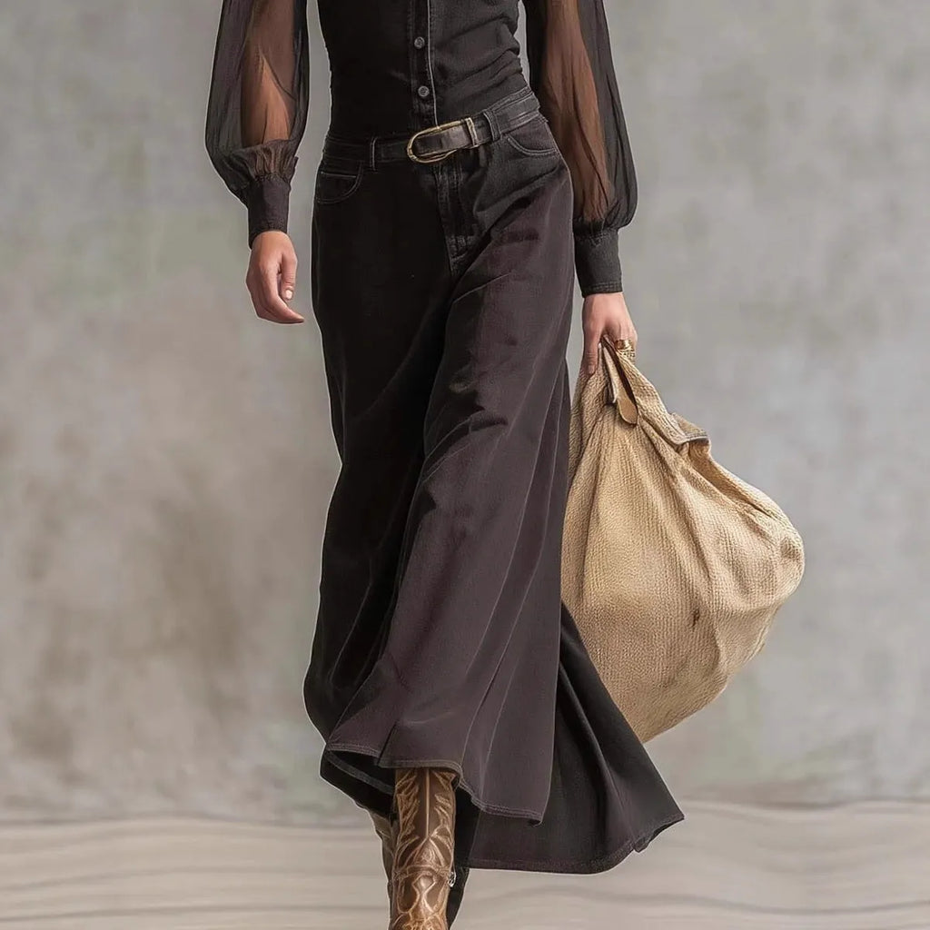 Black long sleeve see-through mesh dress with blouse collar and asymmetric hem pulled over model