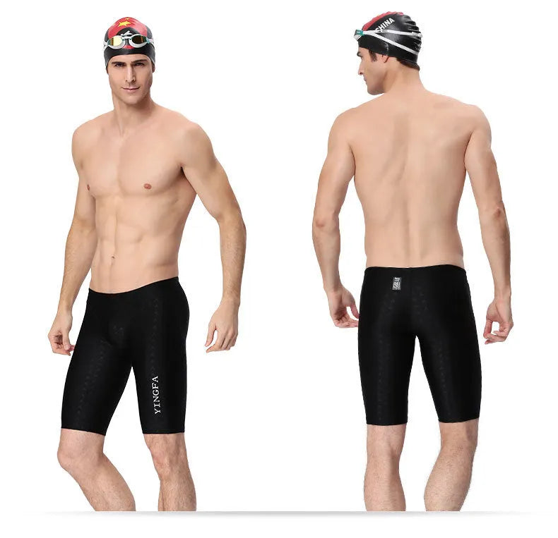 Kids race training swim trunks in black polyester spandex, front view, sizes XS to 3XL
