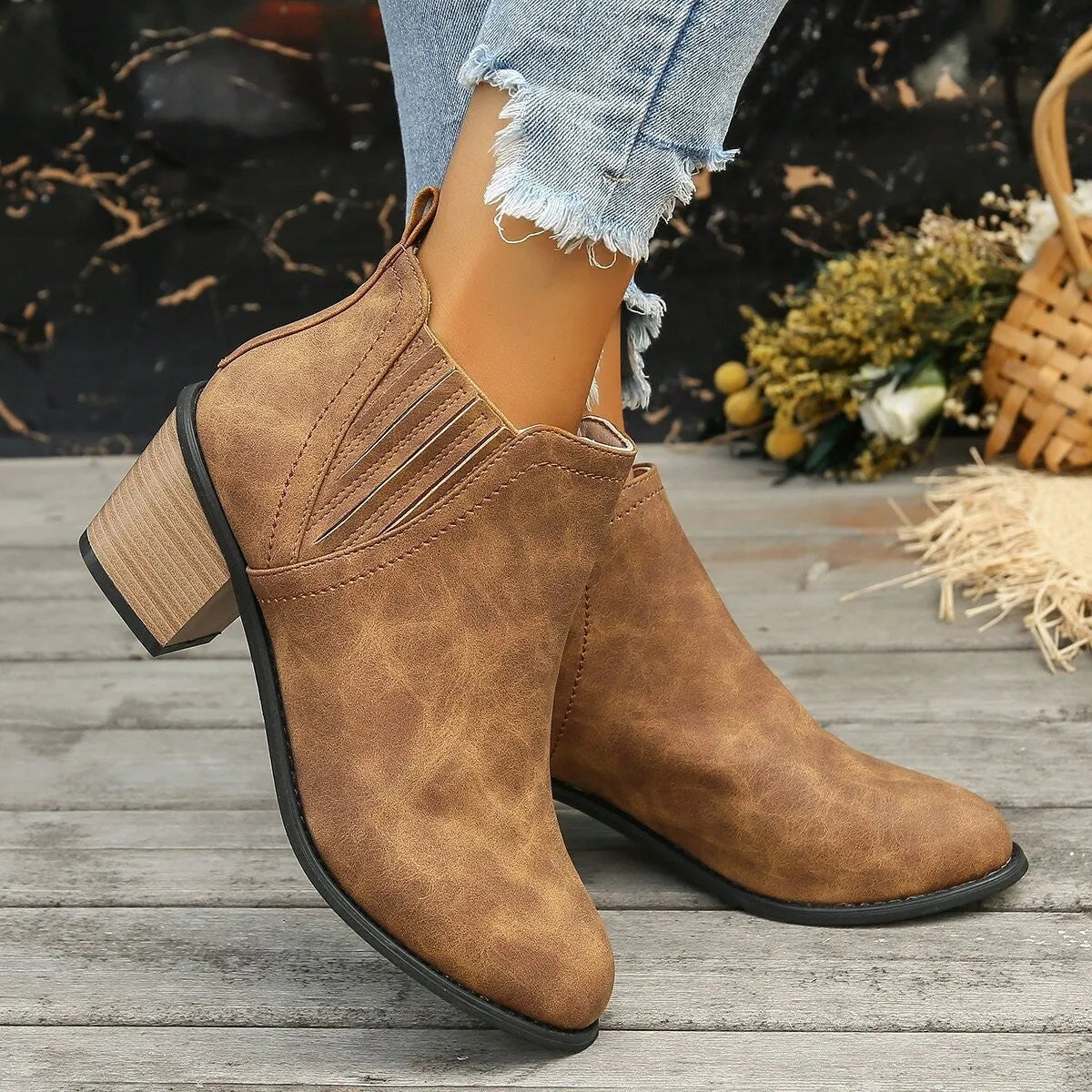 Women's black pointed toe ankle boots with a thick square low heel, made of artificial PU.