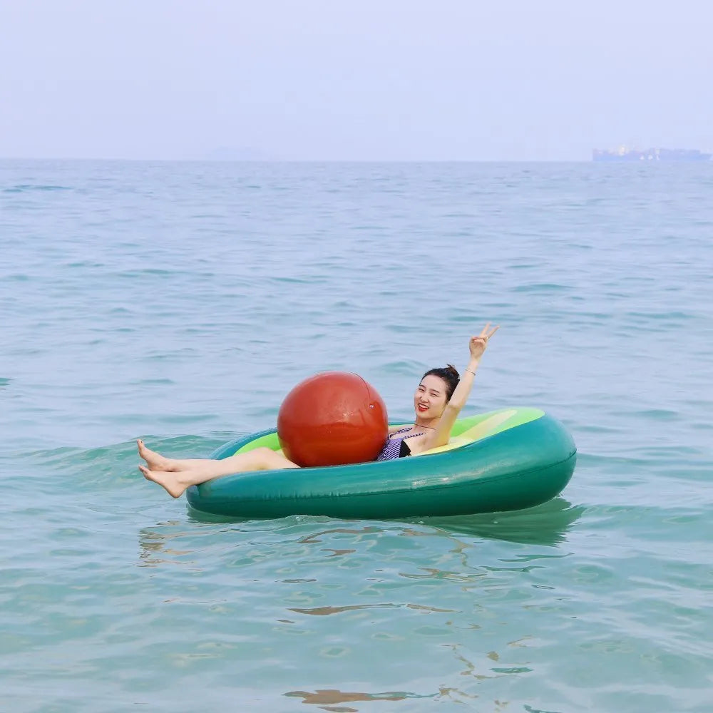 Large green inflatable avocado-shaped pool float measuring 169cm long