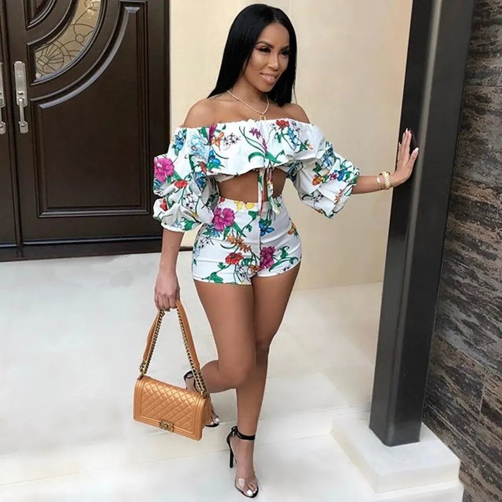 Multicolour digital print women's two-piece outfit with pile sleeve top and matching shorts.