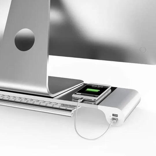 Black computer monitor stand with USB ports on the front and a hidden keyboard storage compartment underneath