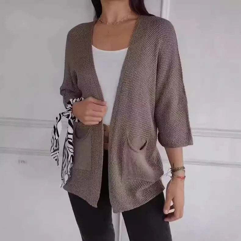 Women's waffle-textured cardigan coat with nine-quarter length sleeves in Army Green.