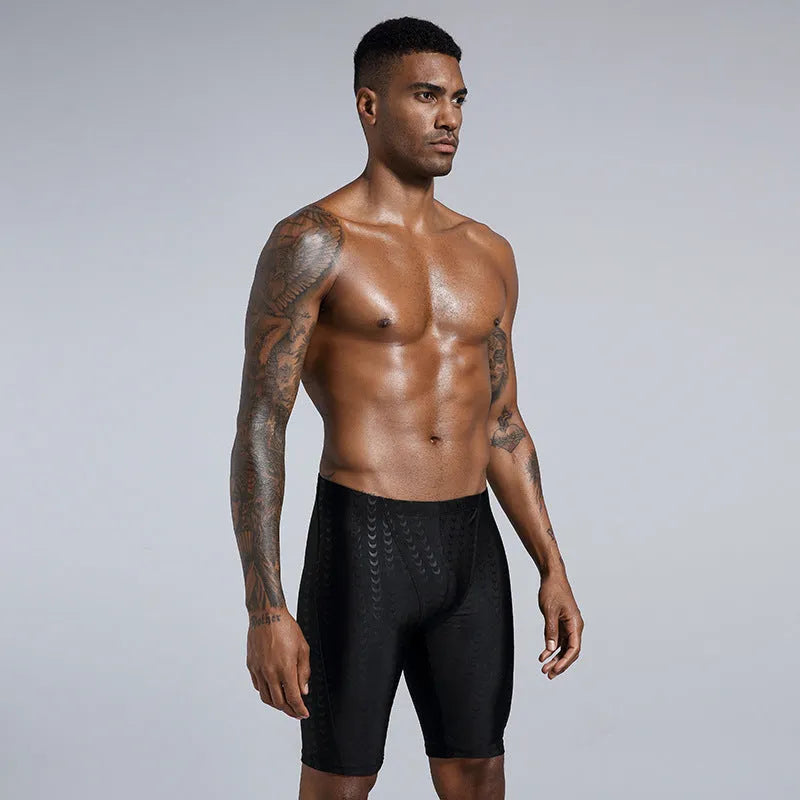 Men's solid colour waterproof polyester swimming trunks on a size chart showing XL, XXL, 3XL, 4XL.