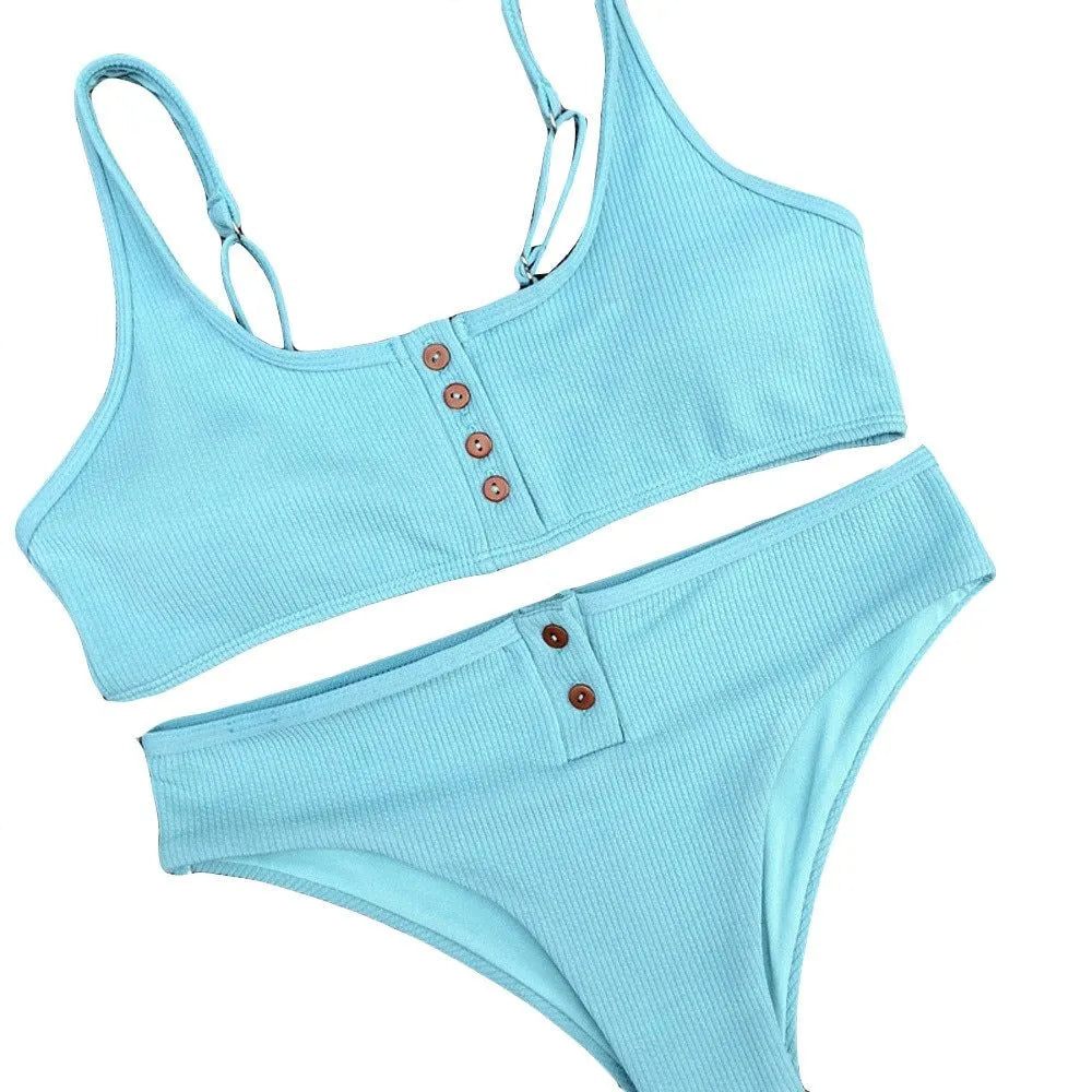 Women's solid colour bikini set with push up padded bra in black, blue, and white available in sizes S M L XL