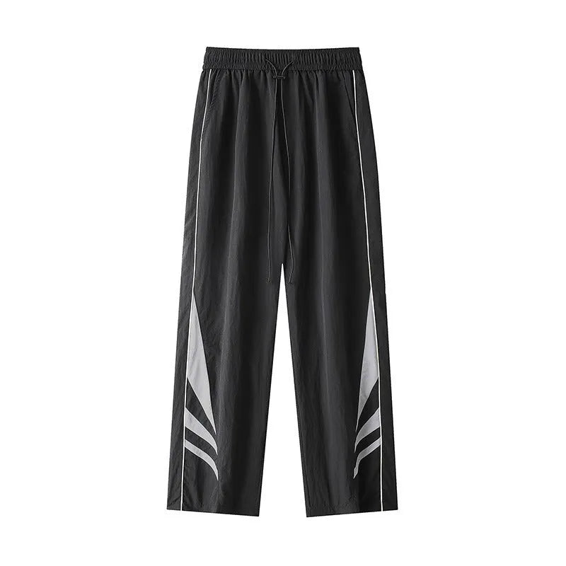 Men's straight leg casual trousers in black, featuring a mid waist with elastic and a cardigan button fly.