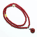 Cinnabar purple gold sand Buddha beads rosary hand-woven bracelet on neutral background
