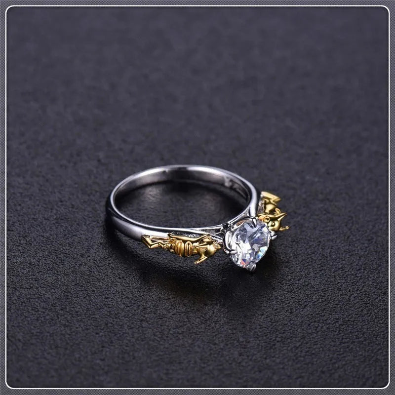 Copper crown fashion ring with black gold finish on a hand.