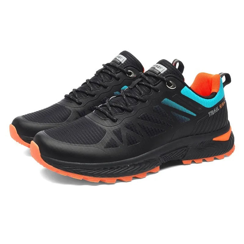 Men's black and orange breathable mesh running shoes with rubber sole on a white background.