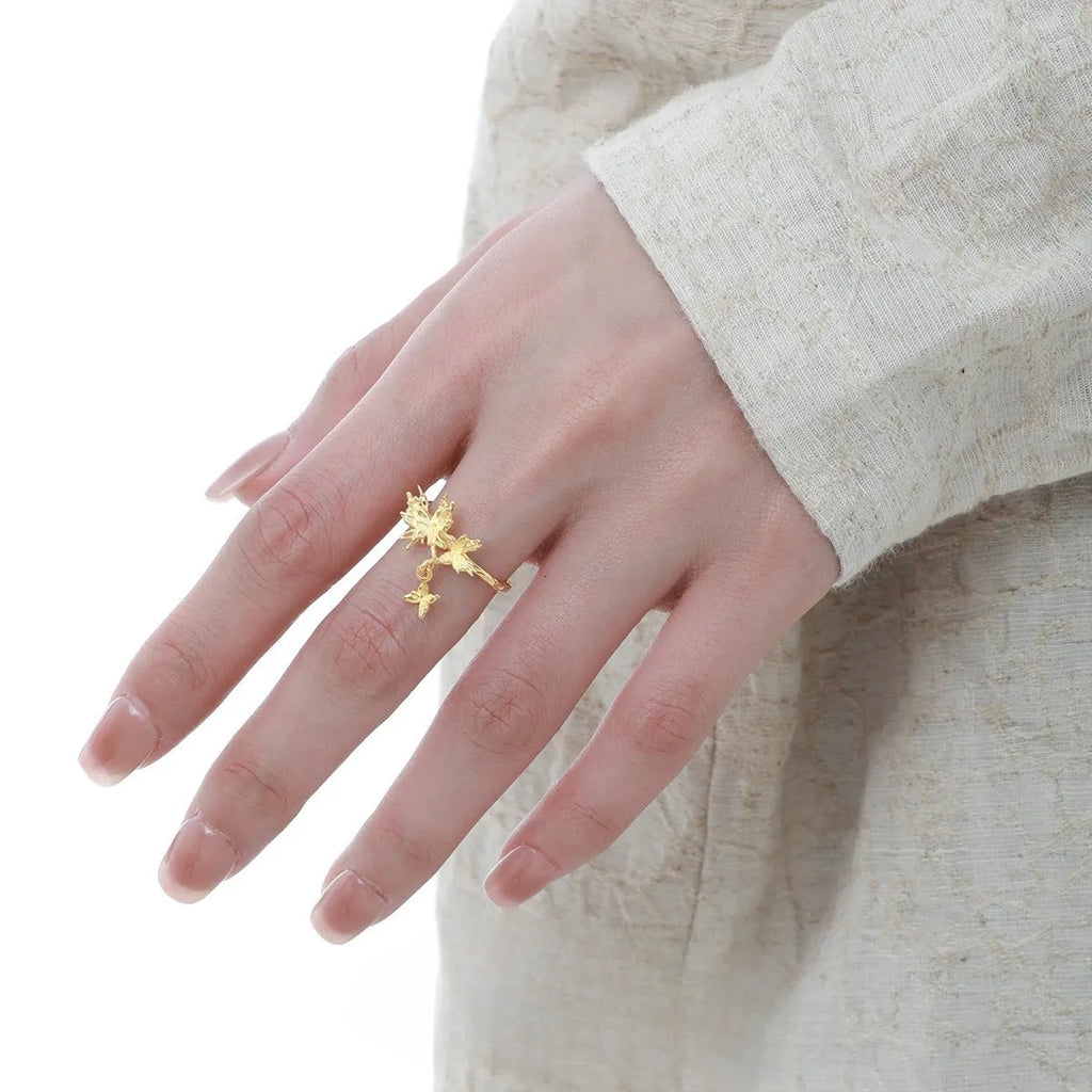 Silver butterfly ring with adjustable opening in electroplated gold finish