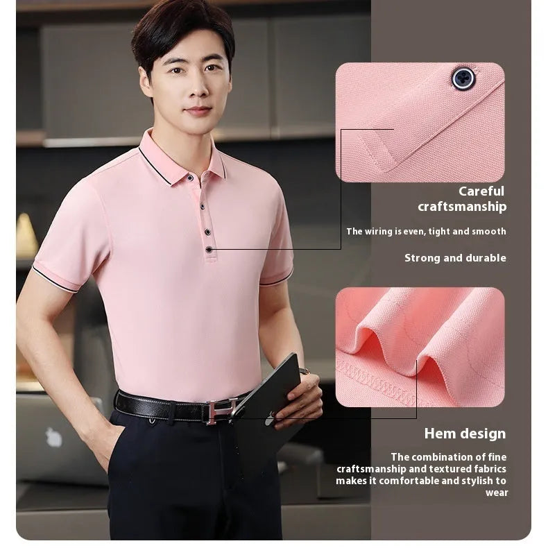 Short-sleeved beautician work polo shirt in cool silk cotton on a hanger, showing asymmetric detail and collar.