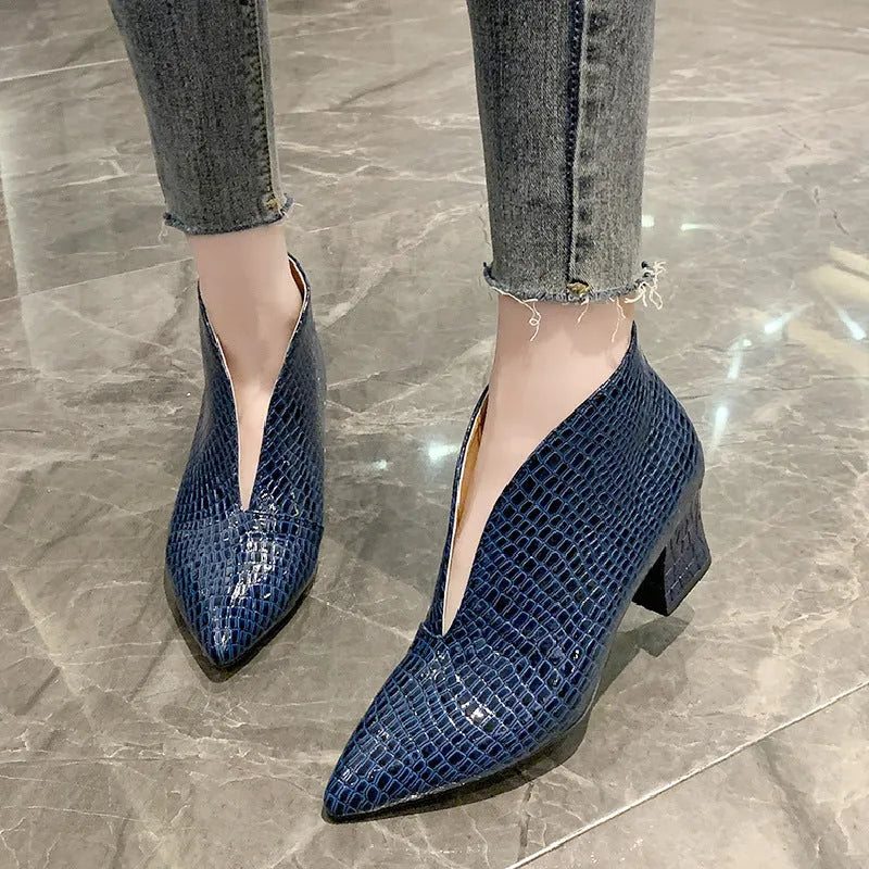 Women's black V-cut ankle boots with pointed toe and chunky 6-8 cm heels, embossed artificial PU upper