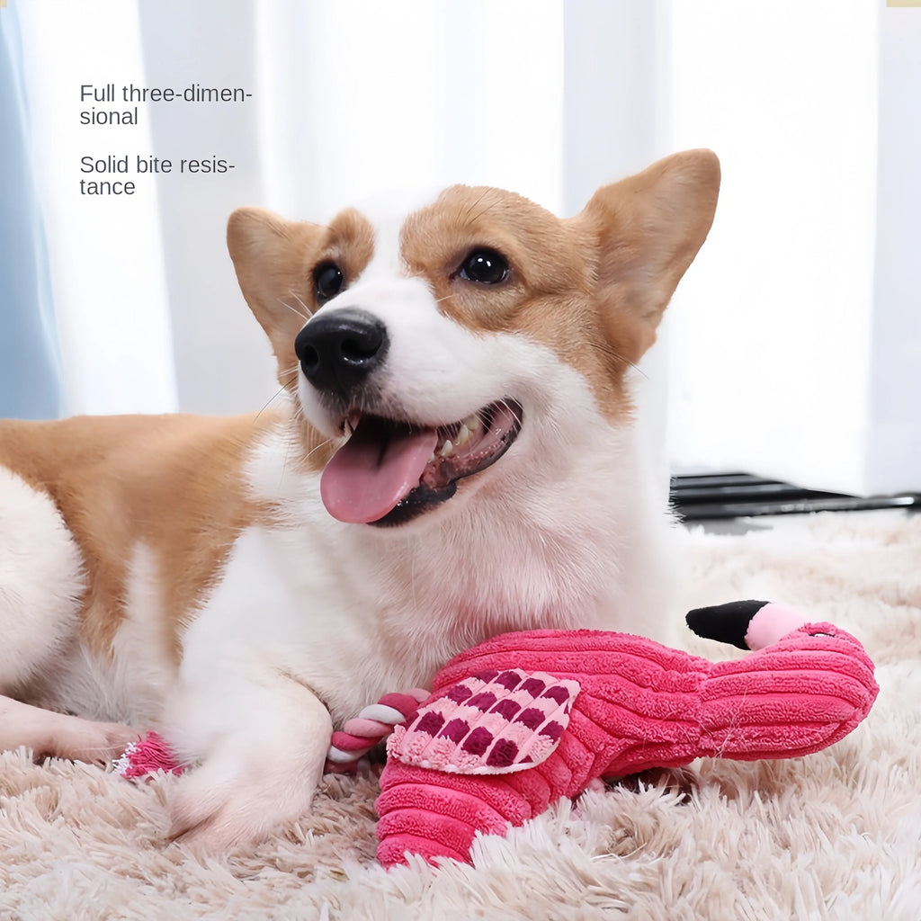 Pink corduroy animal-shaped dog toy with internal squeaker for bite-resistant play.