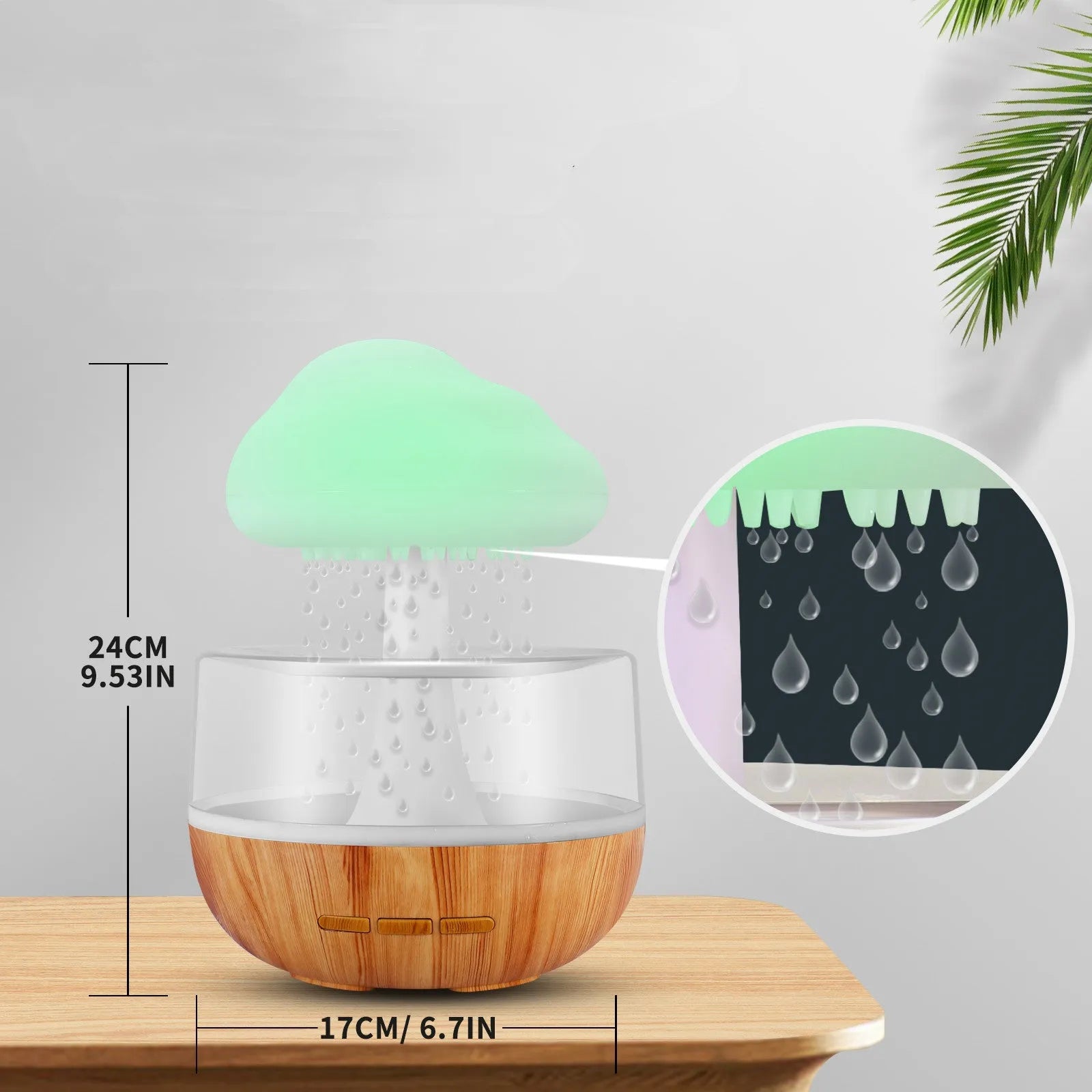 White cloud-shaped humidifier with multi-colour night light on a table.