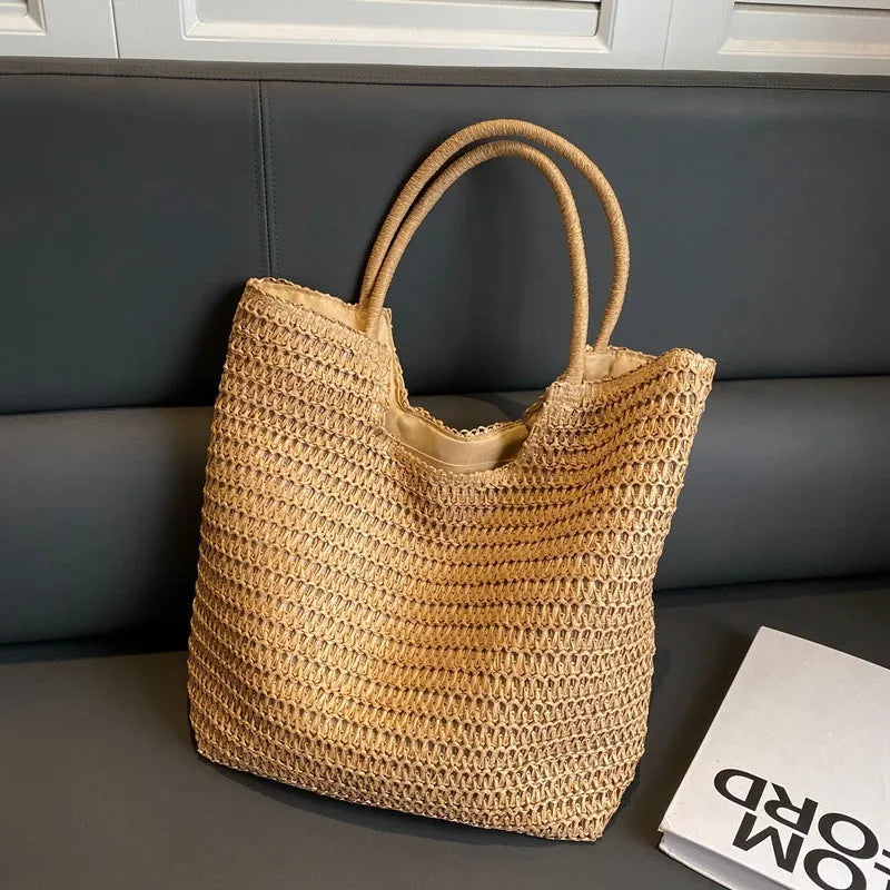 Women's large capacity straw bag in beige with canvas lining and double shoulder straps