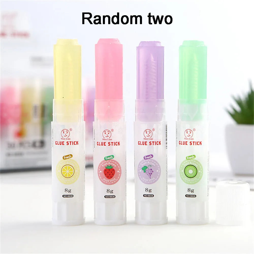 Jelly solid glue stick with fruit printing, 8.5 cm long, shown next to a ruler for scale.
