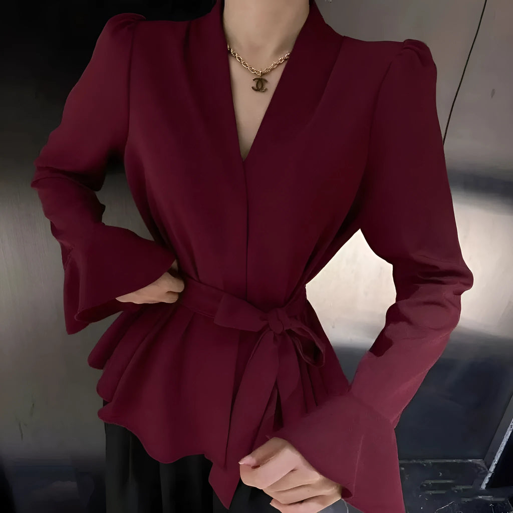 Women's black polyester shirt with a French-style irregular collar and long bell sleeves.