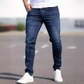 Men's slim-fit dark blue casual jeans with a worn wash and medium elastic cotton fabric.