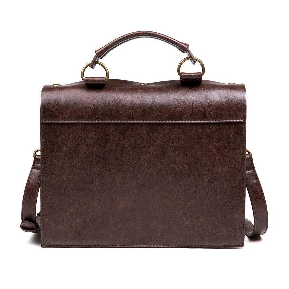 Bronze steampunk industrial retro style shoulder bag with metal hardware on a horizontal square pillow shape