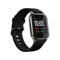 Black waterproof smart bracelet with 1.4 inch screen and silicone strap on a wrist