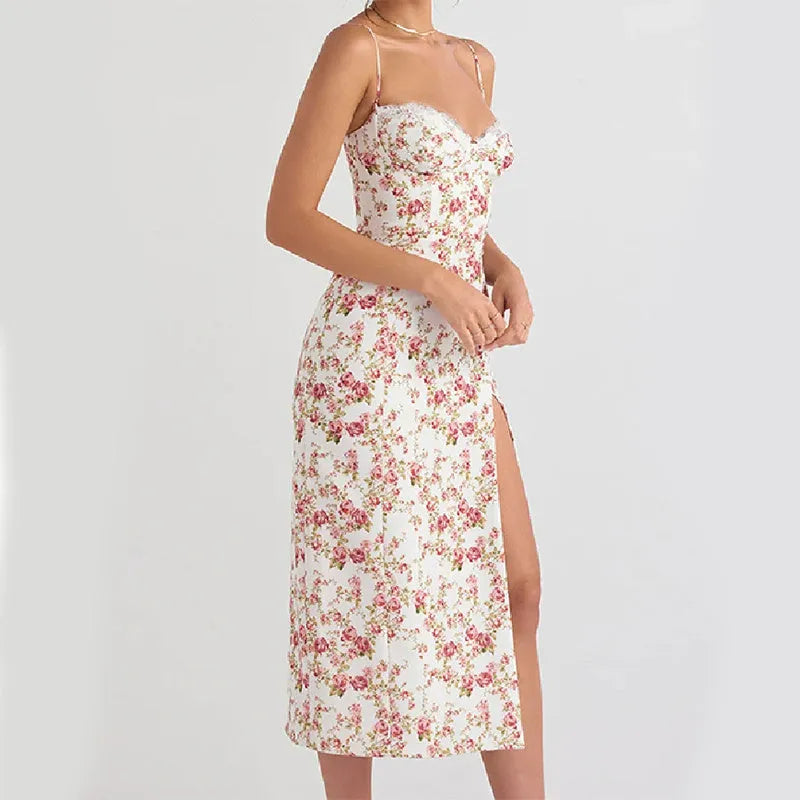 Blue lace floral print long dress on a model, showing side slit and suspender straps.