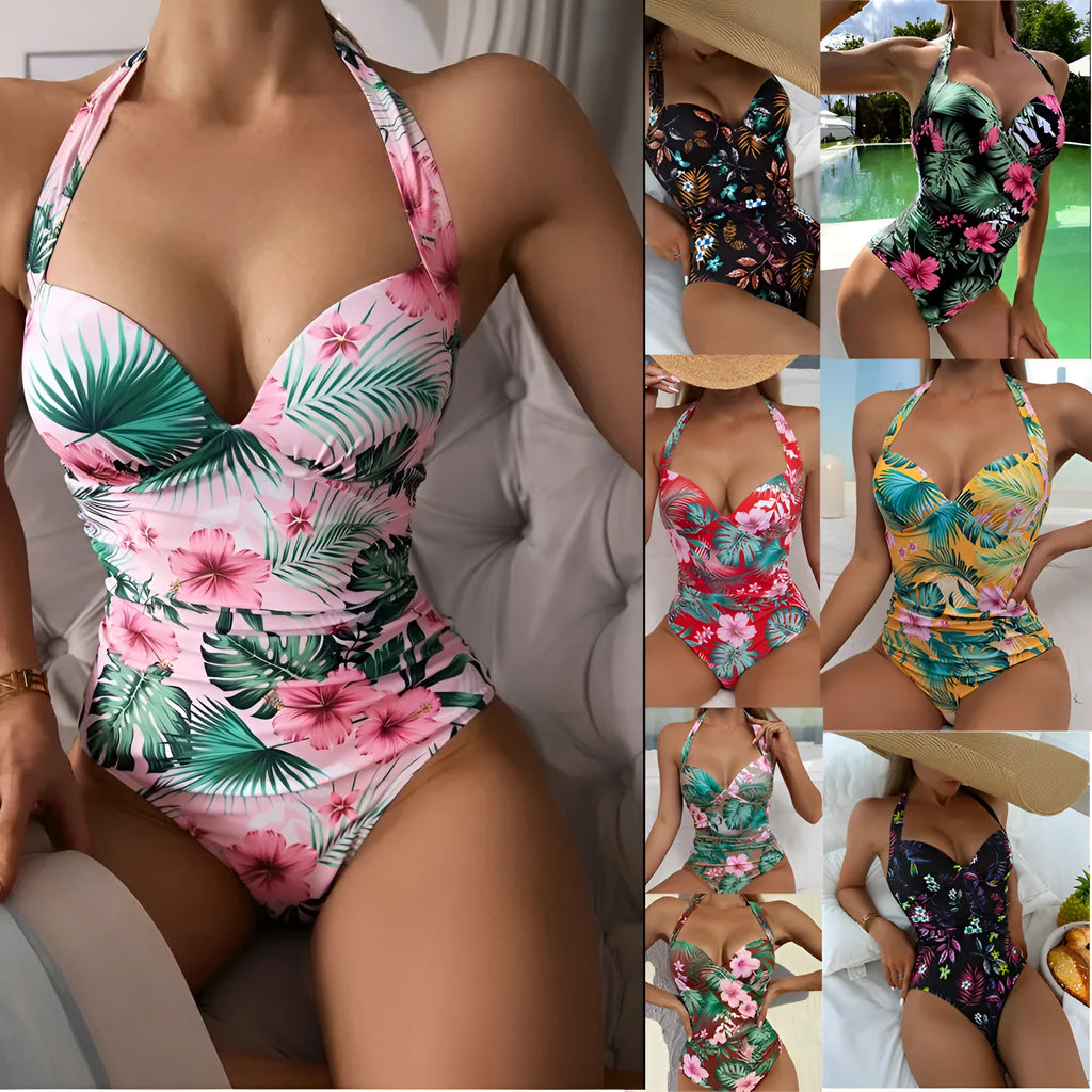 Women's printed halter-neck one-piece swimsuit on a mannequin, showing backless design.