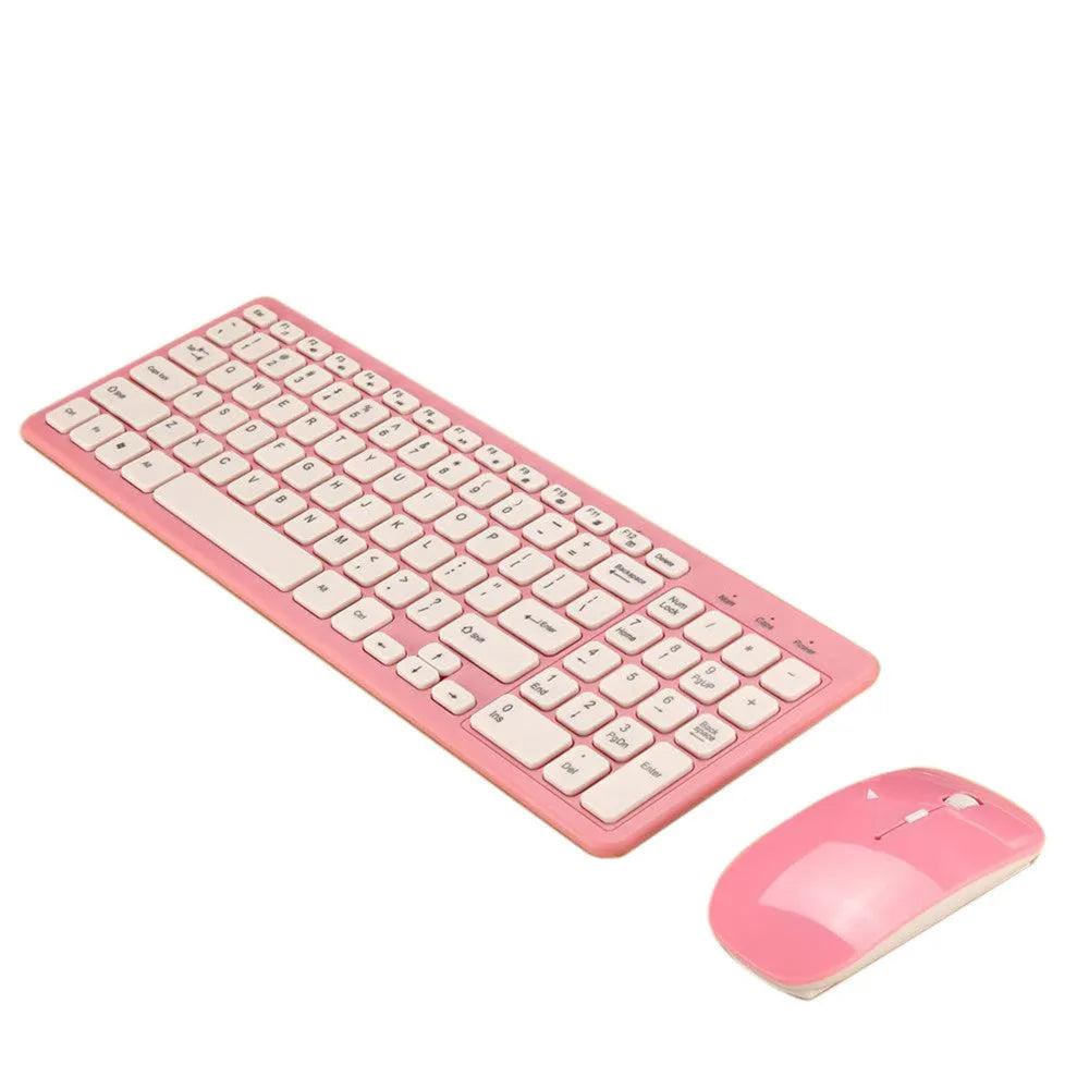 Black, white, pink, and blue wireless keyboard and mouse set with a micro USB receiver on a desk.