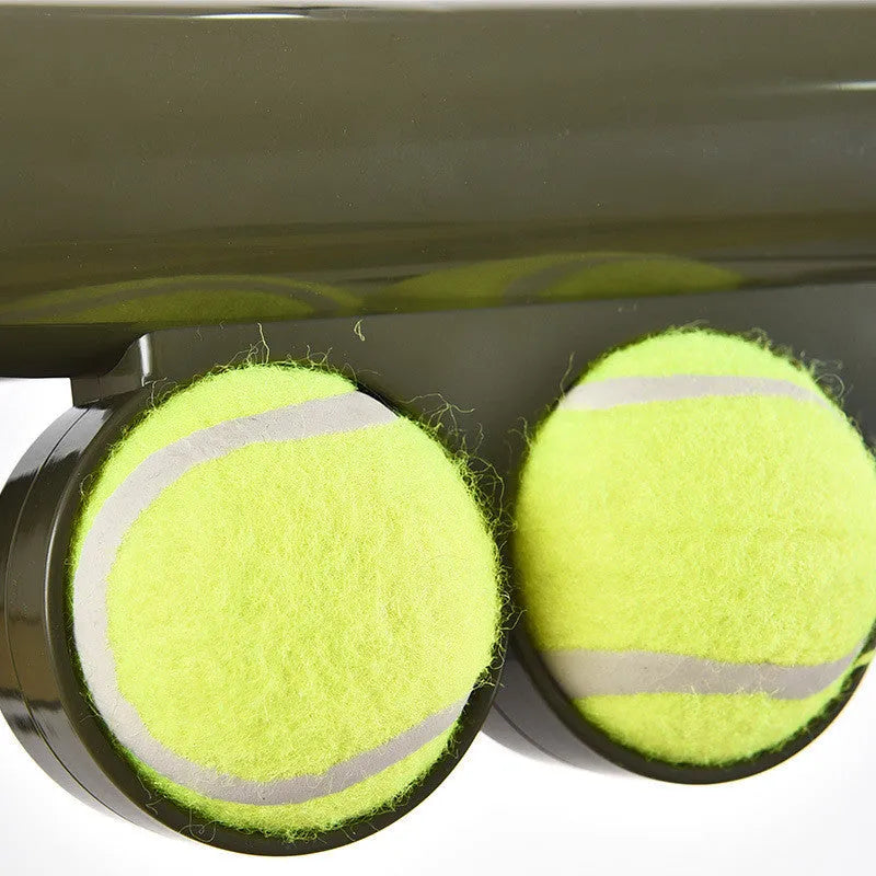 Black ABS plastic tennis ball launcher for dogs with two tennis balls