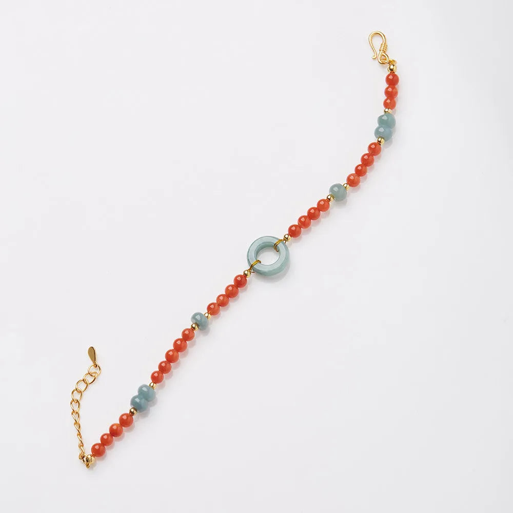 Women's South Red Agate bracelet with geometric patterns and an adjustable safety buckle.