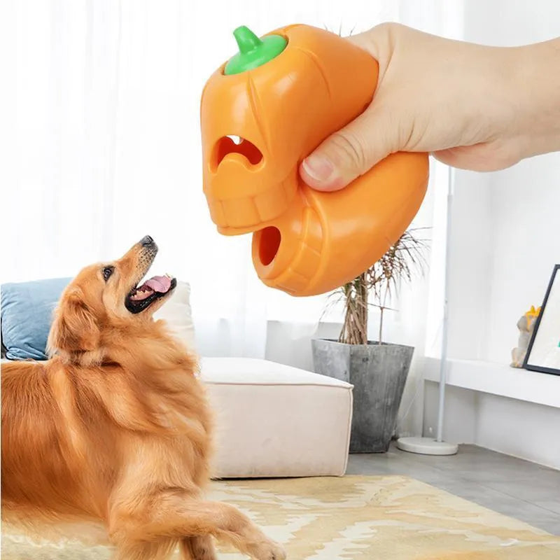 Yellow pumpkin-shaped TPR dog chew toy measuring approximately 8.6x11.5cm