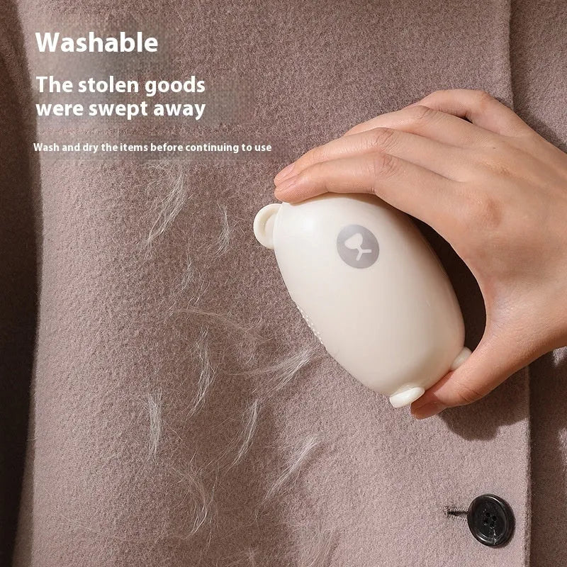 Washable lint removal roller in green, pink, or white colour with ABS plastic body