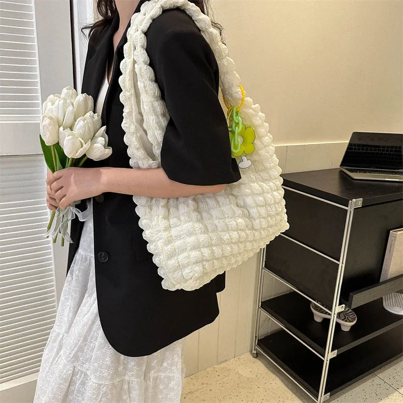 Women's pleated bubble crossbody handbag in soft polyester with pendant accessory
