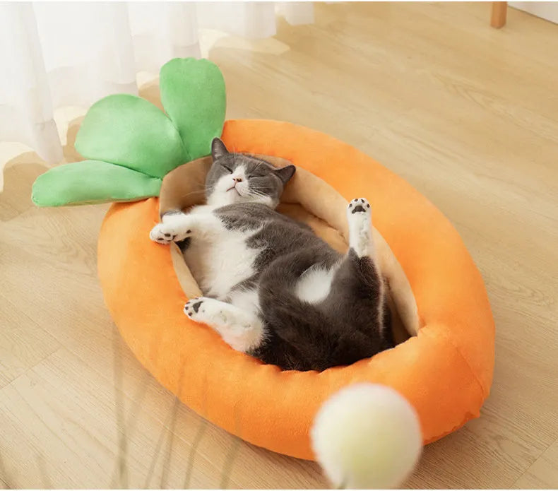 Carrot-shaped nesting dog bed with a soft blanket for small to medium-sized dogs.