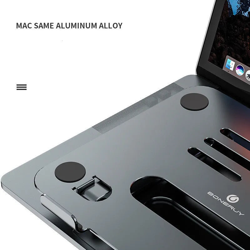 Grey silver aluminium alloy double-layer desktop computer stand with heat sink on a desk