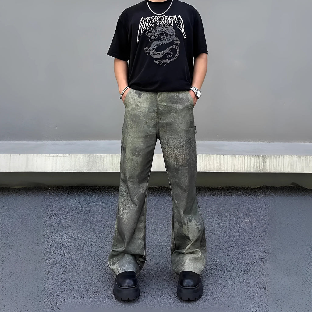 Men's straight leg jeans with a retro digital camouflage print on blue denim.