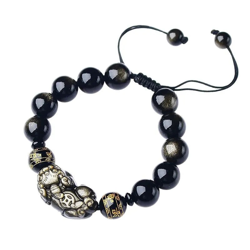 Original hand-woven golden obsidian Pi Xiu bracelet showing bead detail and Chinese style design